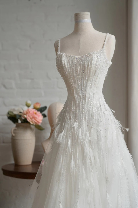 Custom made pearl and feather embellised bodice wedding dresess Perth Subiaco 6008 Envious Bridal & Formal