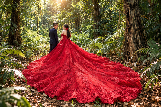 red wedding dress with long dramatic train.